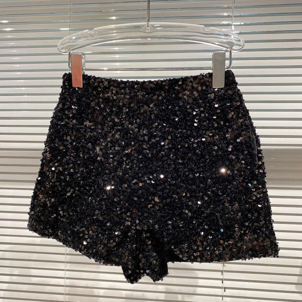Trendy women's shimmer shorts, designed for ultimate summer style. High-waisted fashion bottoms with dazzling bling.