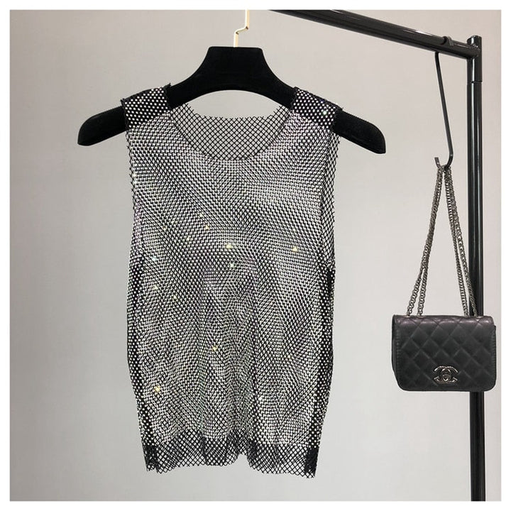 Chic women's sleeveless party top with dazzling sparkle. Ideal for glamorous evening wear & summer nights.