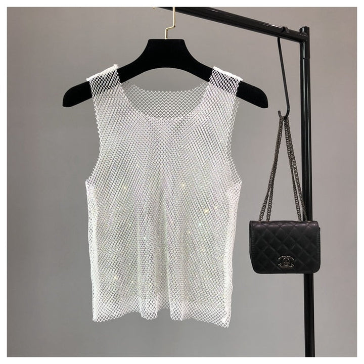 Women's sleeveless dazzling top. Perfect for chic party wear, glamorous evenings & summer fashion statements.