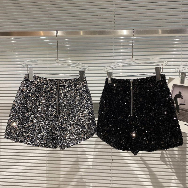 Sparkly women's high-waisted shorts, a versatile choice for casual summer outfits or dazzling party wear.