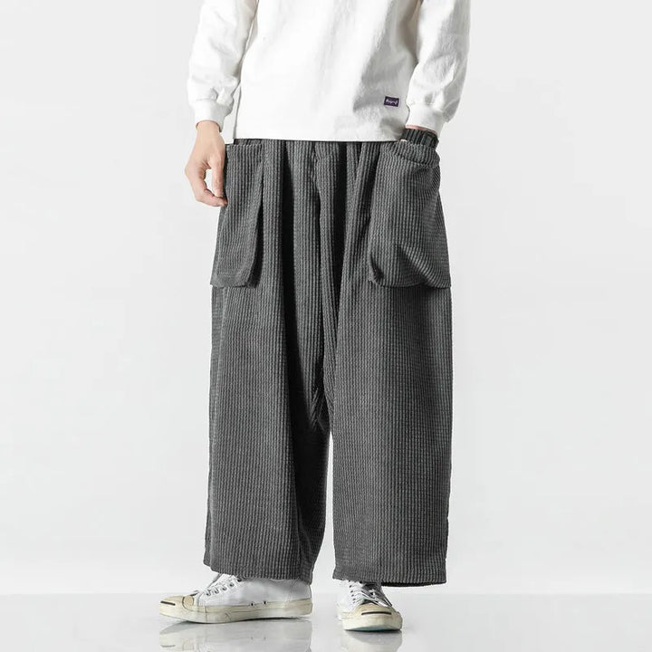 Unisex relaxed fit pull-on sweatpants, perfect for a comfortable, casual, and retro street style look.