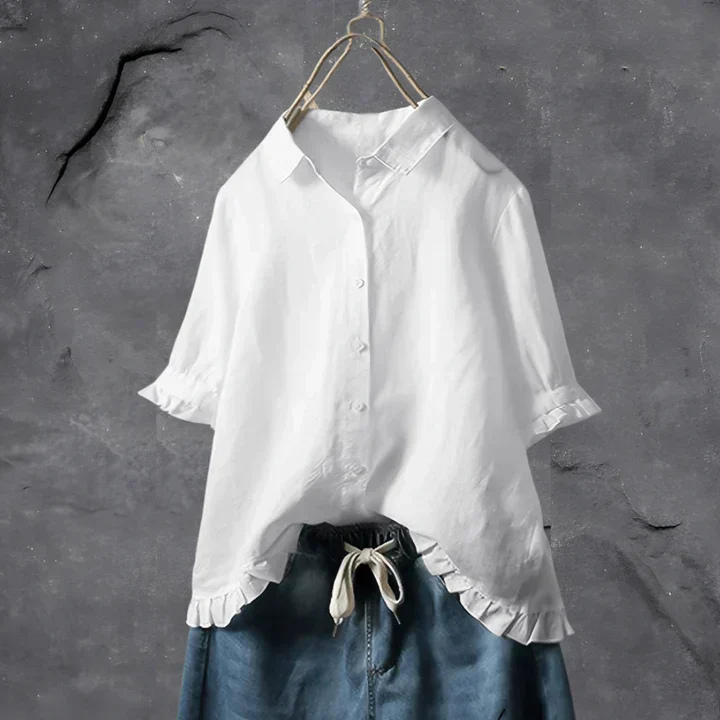 Women's white ruffle-trim button-down shirt with a relaxed fit, perfect as a short-sleeve summer top.