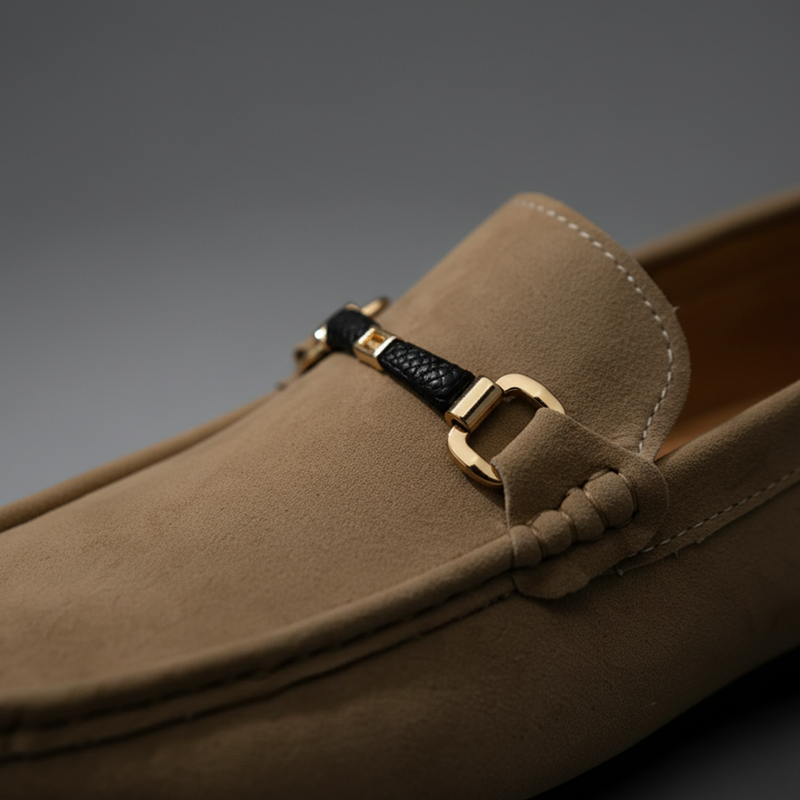 Stylish men's formal loafers with elegant polished metal buckle. Classic slip-on dress shoes.