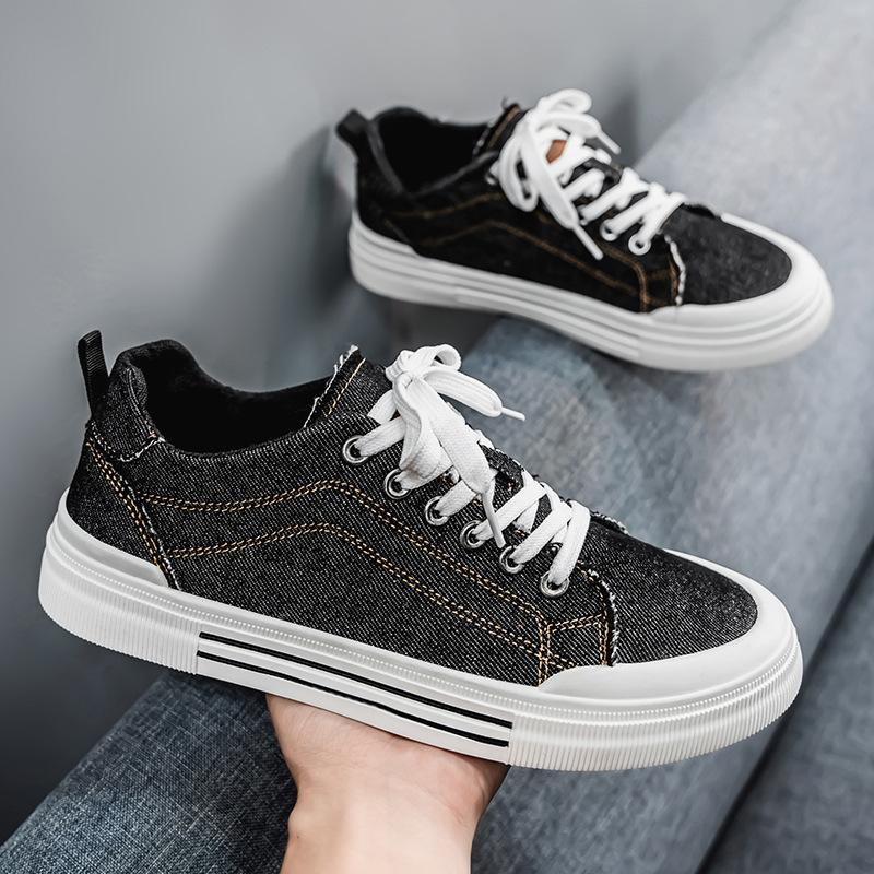 Blue casual men's sneakers, stylish low-top footwear for comfortable urban exploration.