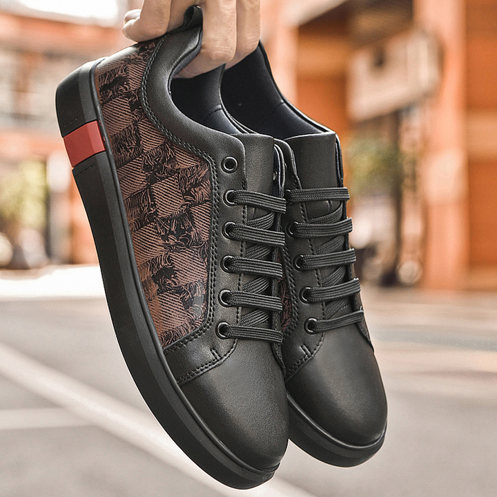 Black men's fashion sneakers featuring signature design and advanced cushioned comfort.