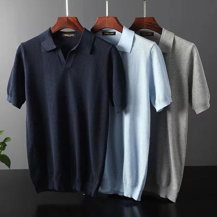 Close-up of a men's premium polo shirt in sky blue, showcasing tailored fit and breathable fabric.