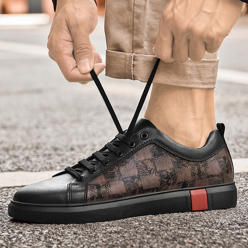 Side view of men's urban style footwear, showcasing signature design and durable construction.