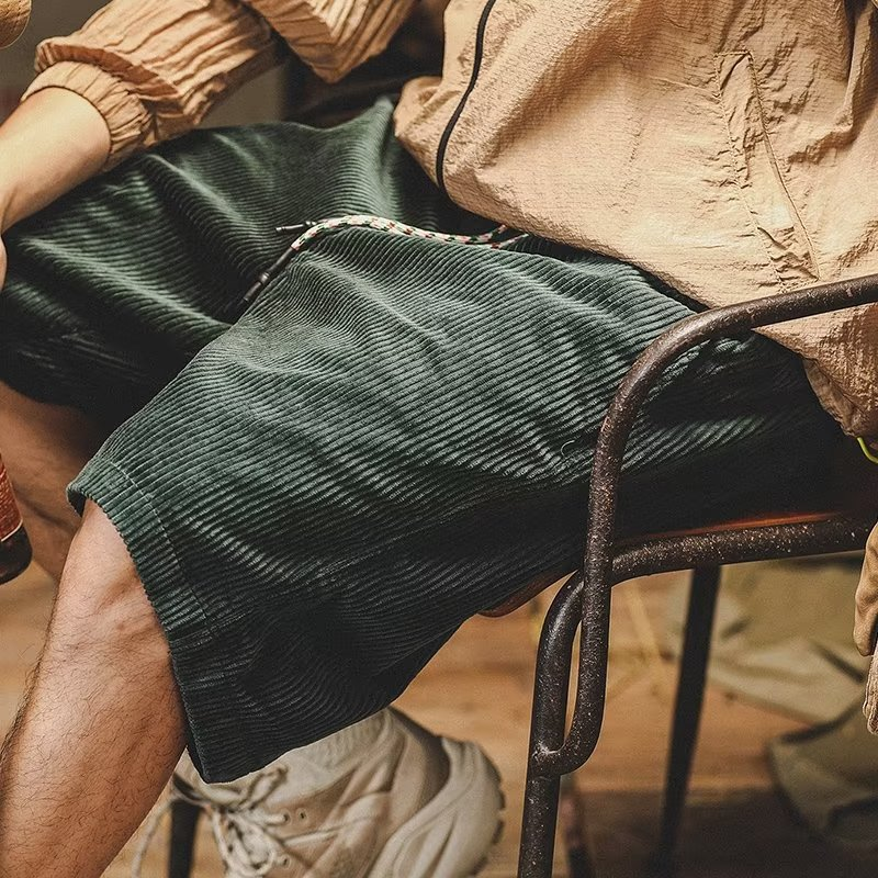 Versatile men's relaxed fit shorts, available in khaki, green, off-white for comfortable casual wear.