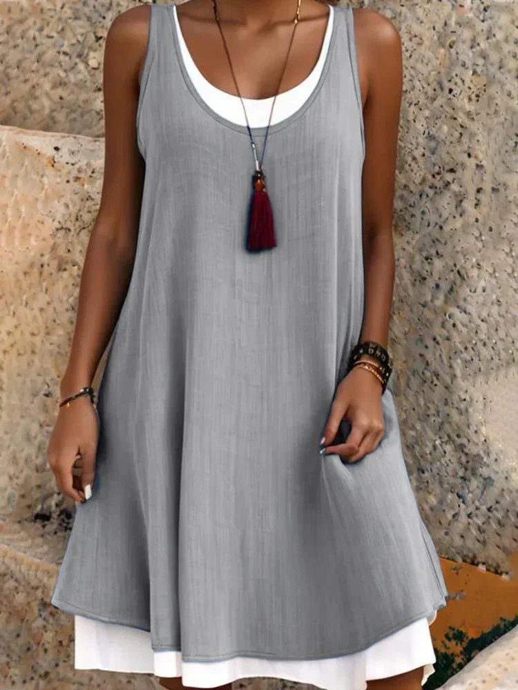 Comfortable two-layer A-line dress for women, featuring a scoop neck and sleeveless design for summer.