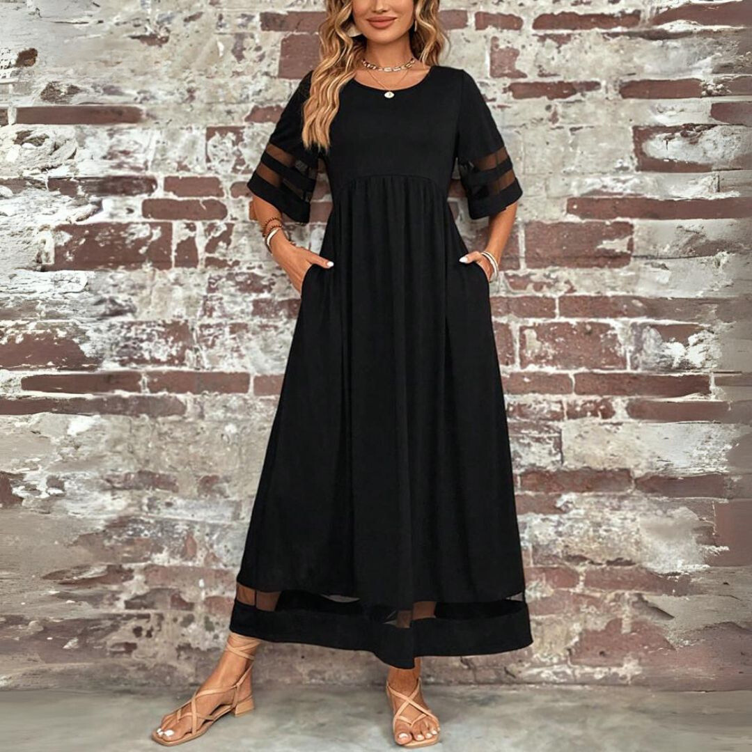 Women's elegant maxi dress featuring stylish mesh panels & a flattering gathered waist. Comfortable long dress.