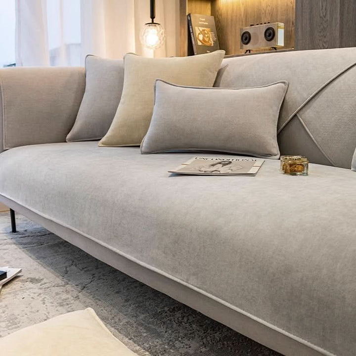 Anti-slip backing of a durable, grey modern sofa cover. Pet friendly, washable couch slipcover for living room protection.