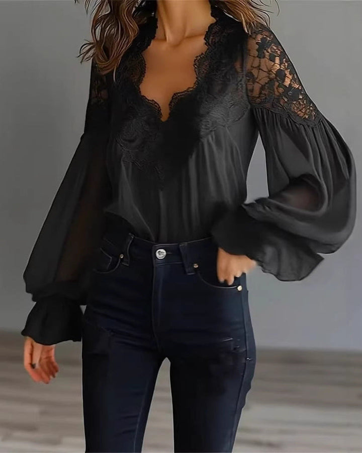 Women's elegant V-neck blouse, featuring dramatic puffed ruffle long sleeves. A stylish formal fashion top.