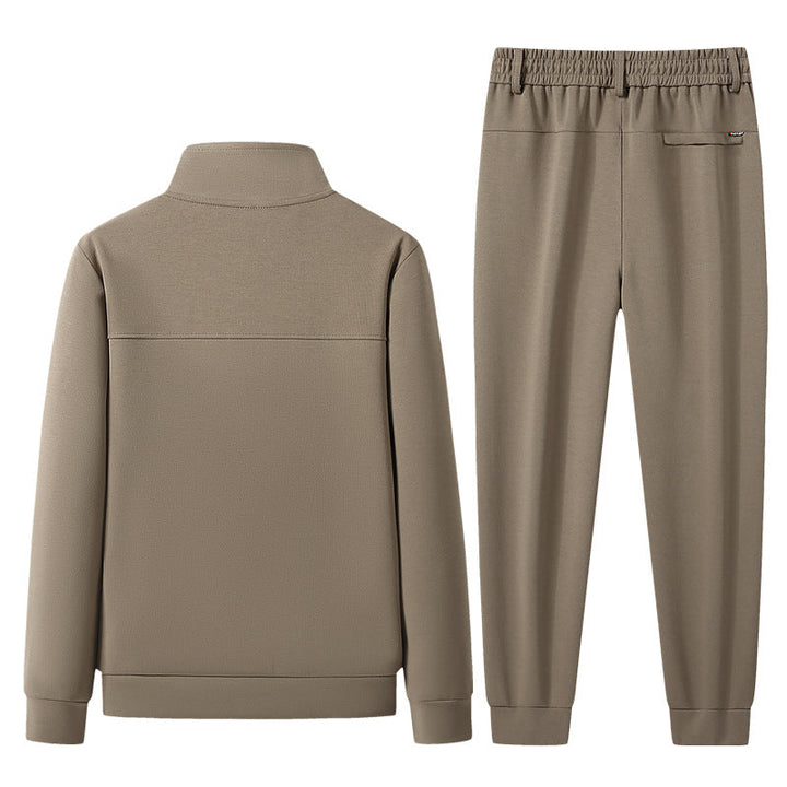 Deep black unisex textured tracksuit set, ideal casual outfit & sportswear. Comfortable, tailored design.
