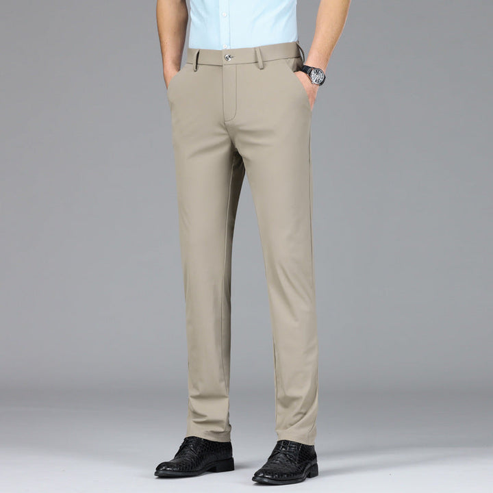 Side view of men's slim fit performance trousers, showing a modern, tailored cut.