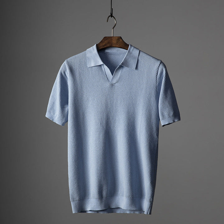 Men's premium sky blue polo shirt, tailored fit for smart casual style & comfort. Breathable summer top.