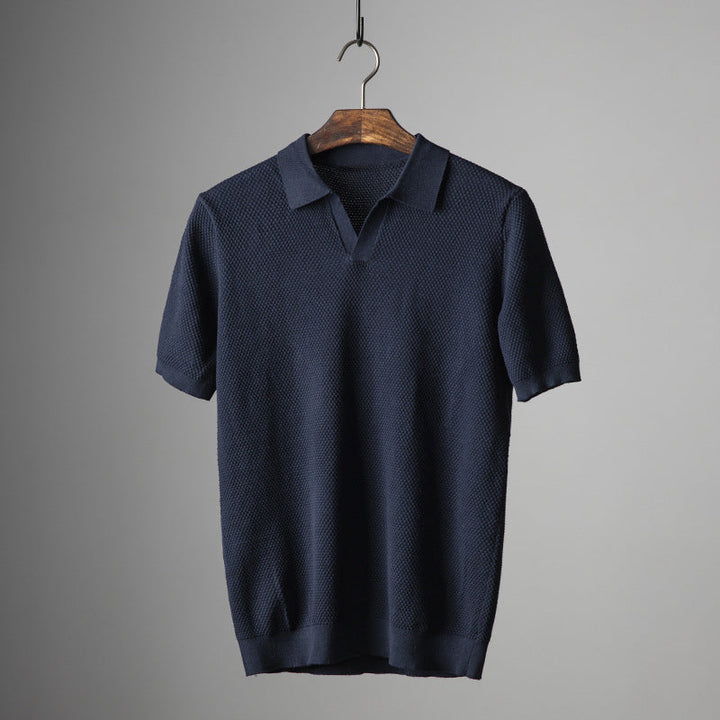 Navy men's polo shirt, comfortable & breathable. Perfect for effortless everyday wear and men's fashion.