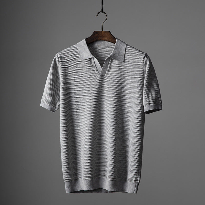 Gray men's premium polo shirt. Tailored fit casual shirt for smart casual occasions. Comfortable summer top.