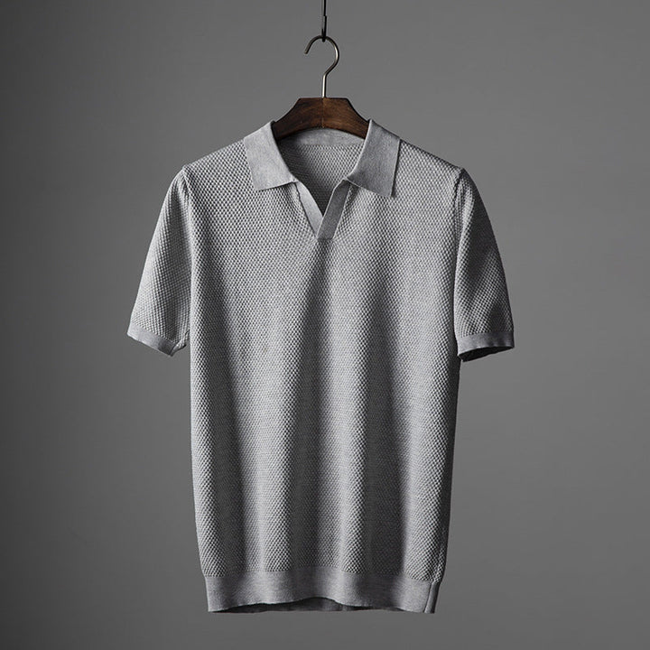 Gray men's premium polo shirt. Tailored fit casual shirt for smart casual occasions. Comfortable summer top.