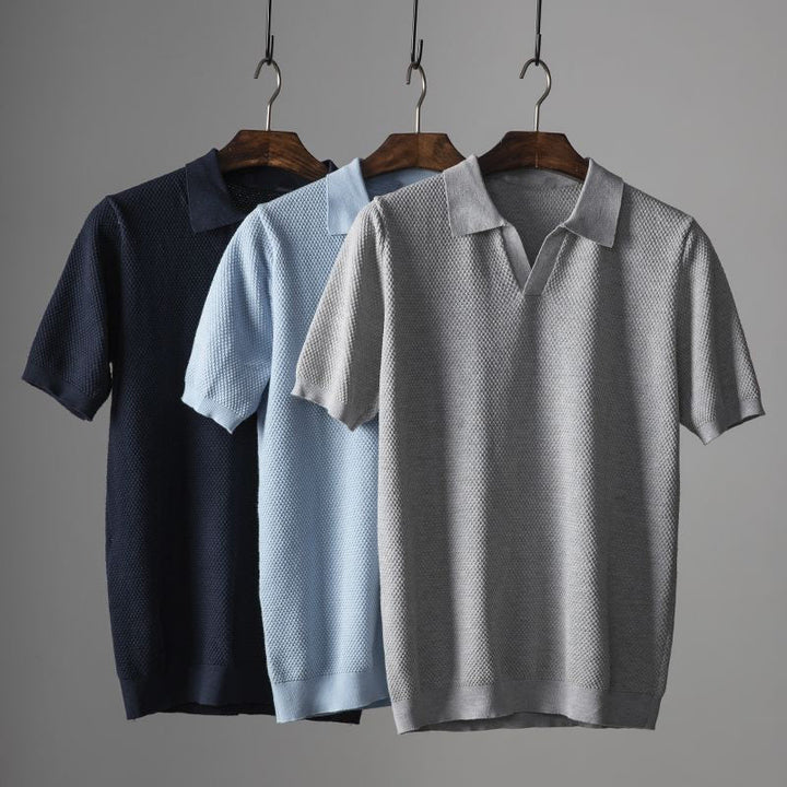 Stylish men's navy polo shirt, offering effortless comfort. A versatile casual summer top with tailored fit.