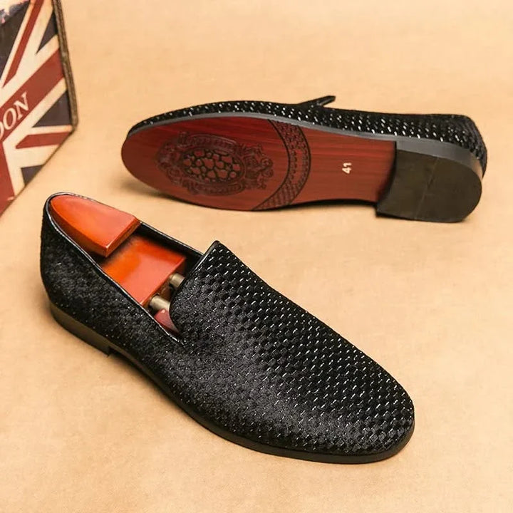 Refined men's classic Italian slip-on loafers. Comfortable dress shoes with a timeless, elegant appeal.