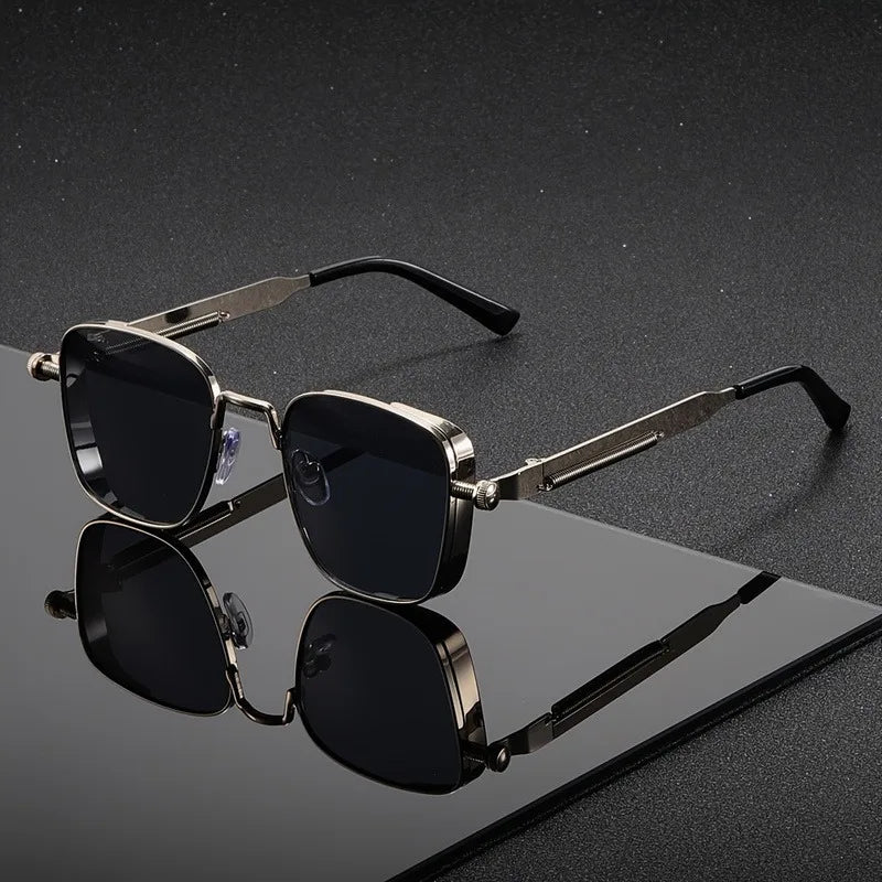 Sleek black unisex square sunglasses with anti-glare lenses and UV400 protection. Essential eyewear.