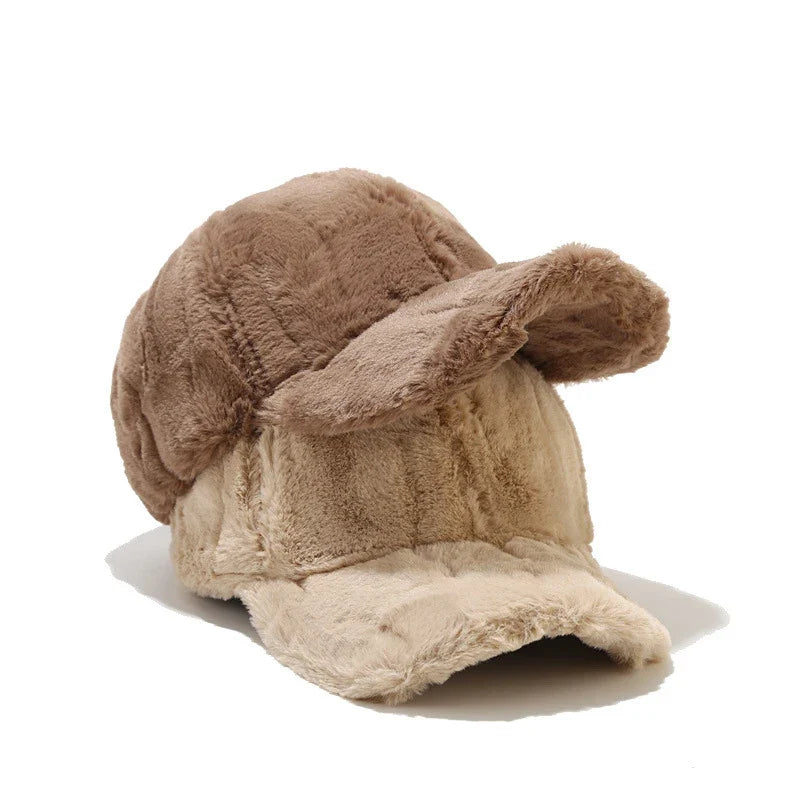 Soft and cozy women's plush faux fur cap, a fashionable winter accessory for ultimate warmth.