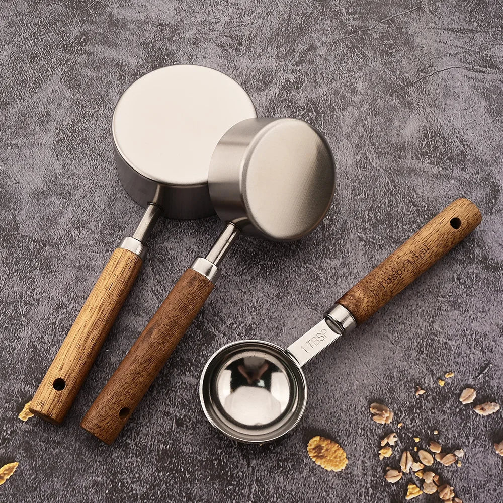 Elegant kitchen measuring spoon set, crafted from durable stainless steel & beautiful wood, for chef-quality results.