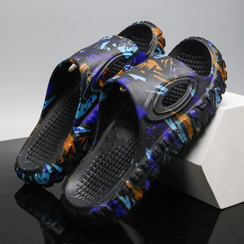 Stylish unisex urban slides, comfortable slip-on sandals with cushioned sole for casual summer footwear.