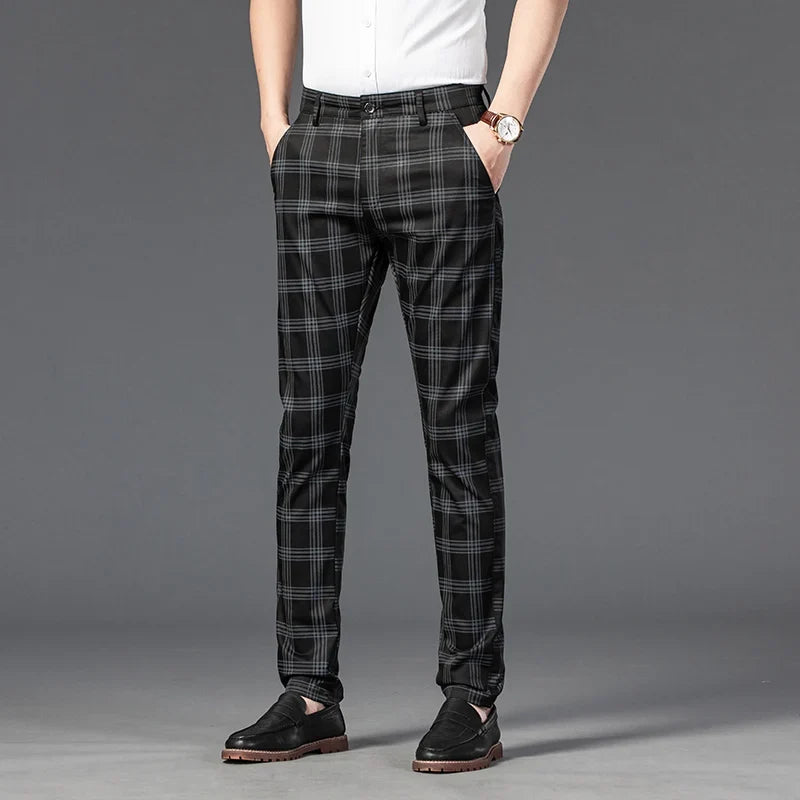 Men's slim fit plaid dress trousers for business casual or formal wear, featuring comfortable stretch fabric.