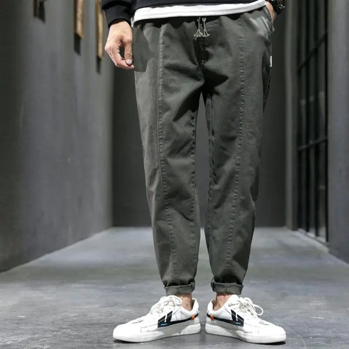 Men's casual athletic joggers in army green, tapered design for ultimate comfort & movement.