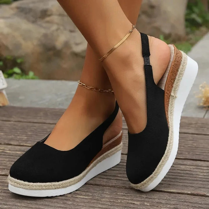 Women's orthopedic sandals with arch & posture support. Comfortable slip-on footwear for daily wear & foot health.