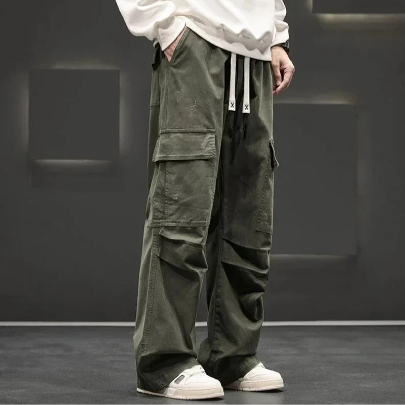 Versatile men's relaxed fit cargo pants with drawstring, suitable for outdoor activities and casual style.