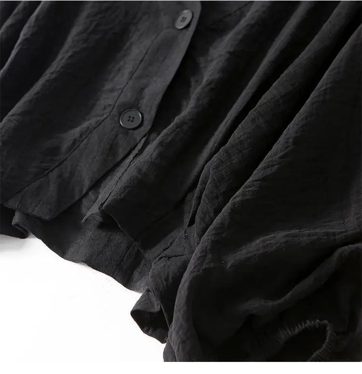 Stylish women's flowy batwing top. Lightweight summer blouse, chic and comfy for warm weather wear.