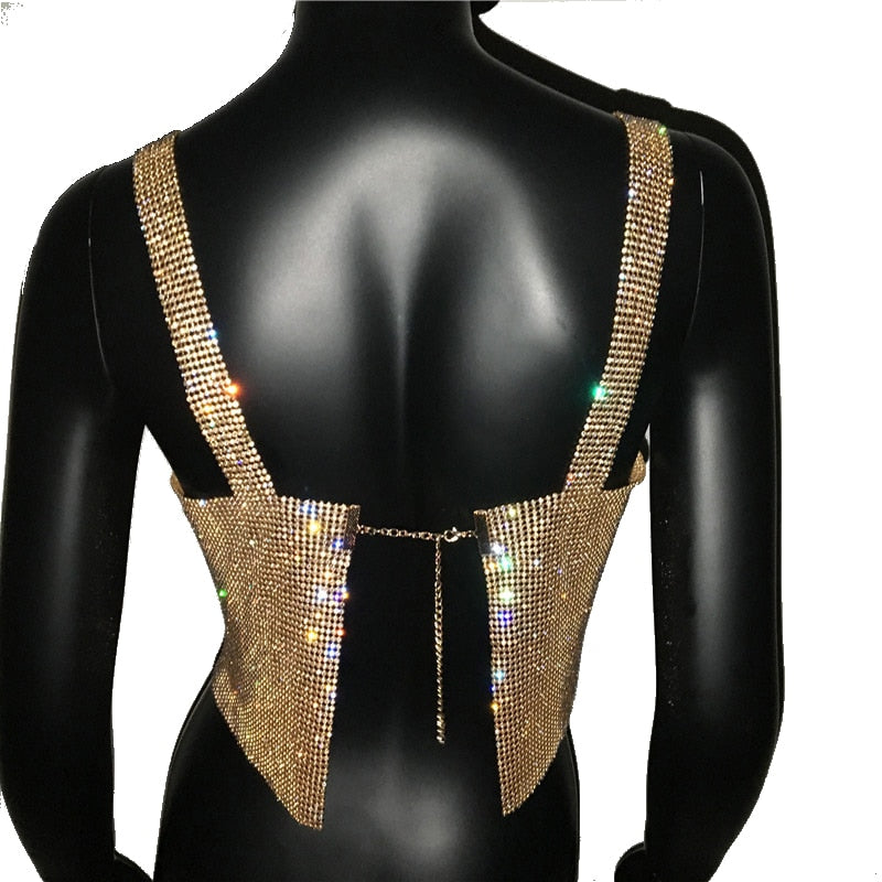 Sparkling women's crop top with bling, delivering glamorous style for evening events and trendy night outs.