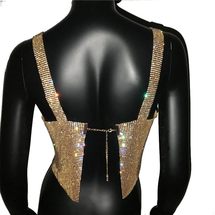 Sparkling women's crop top with bling, delivering glamorous style for evening events and trendy night outs.