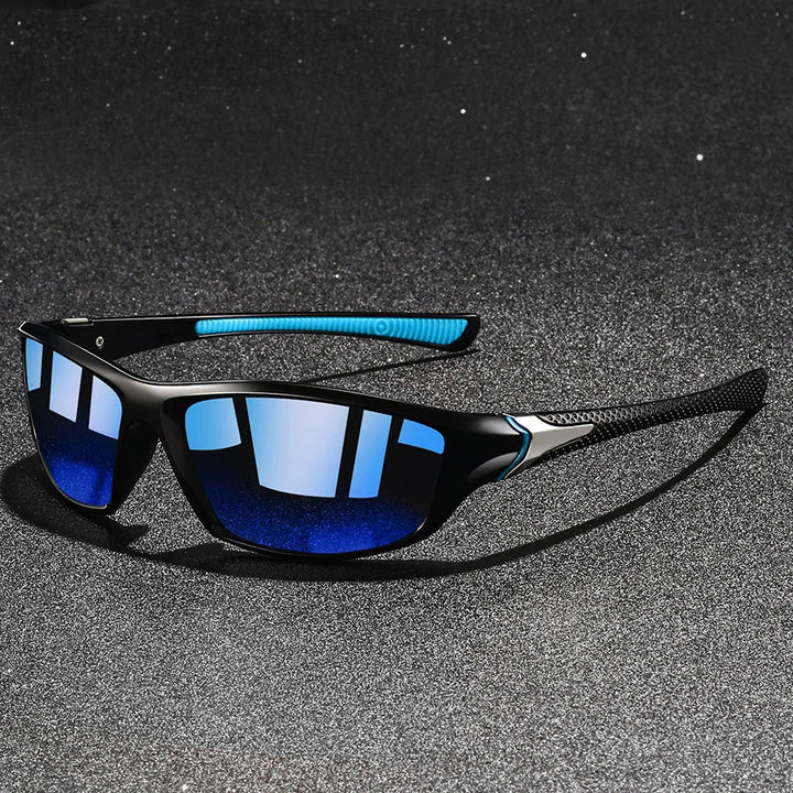 Sleek black frame polarized sport sunglasses for men & women, enhancing vision & providing UV protection outdoors.