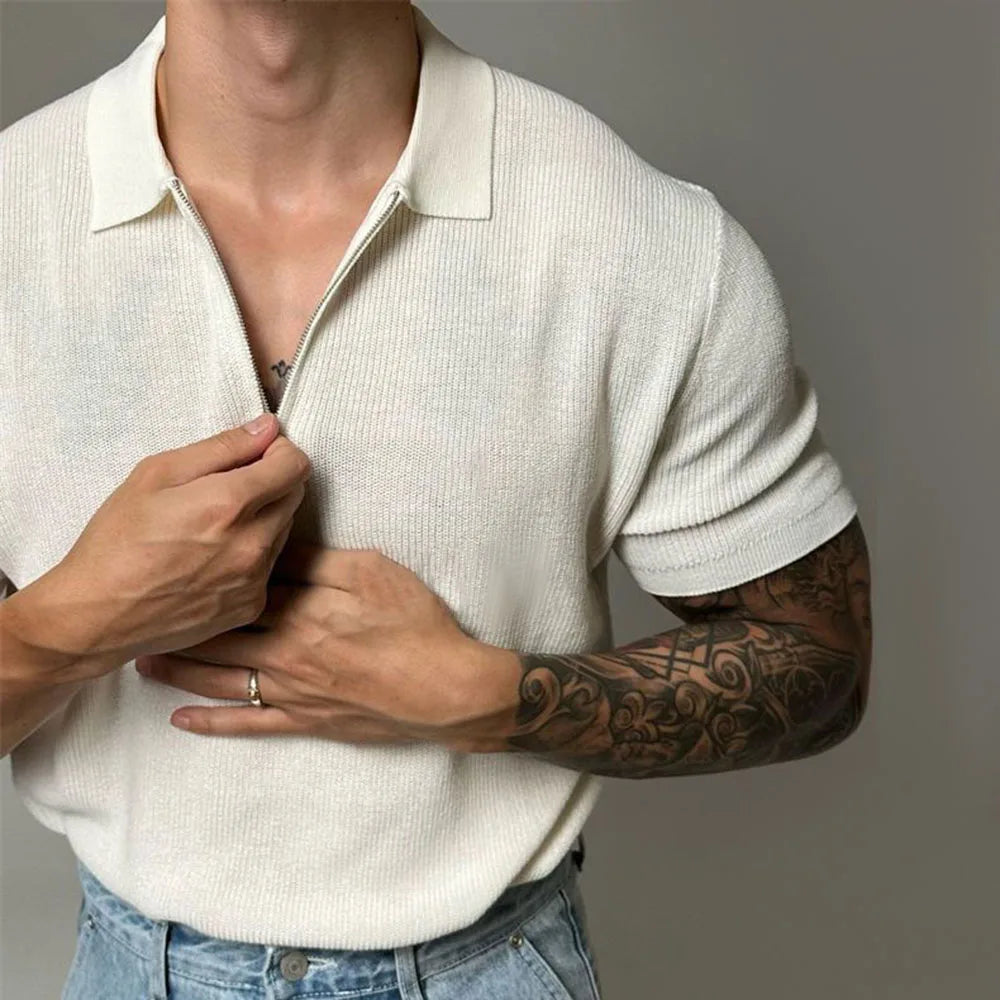 Detail of the soft, comfortable knit fabric of a Men's Contour Zip-Up Polo Shirt, modern and casual.