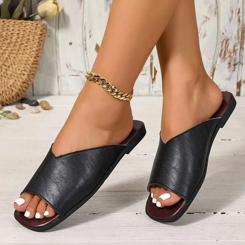 Women's elegant open-toe flats, perfect for effortless summer style and comfort.