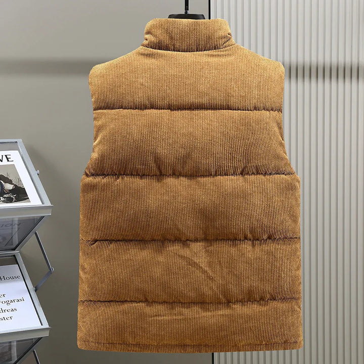 Insulated unisex vest, providing lightweight warmth for men & women. An essential, durable piece for any casual outfit.