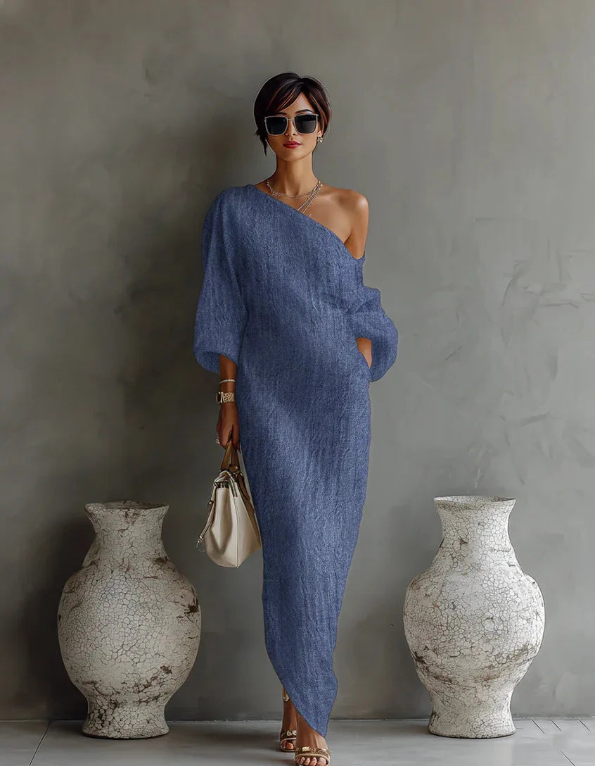Comfortable women's one shoulder asymmetrical dress. Relaxed fit, batwing sleeve, and side pocket for elegant style.
