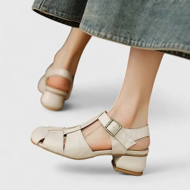 Modern women's evening sandals, strappy design with a sophisticated square toe and comfortable block heel.