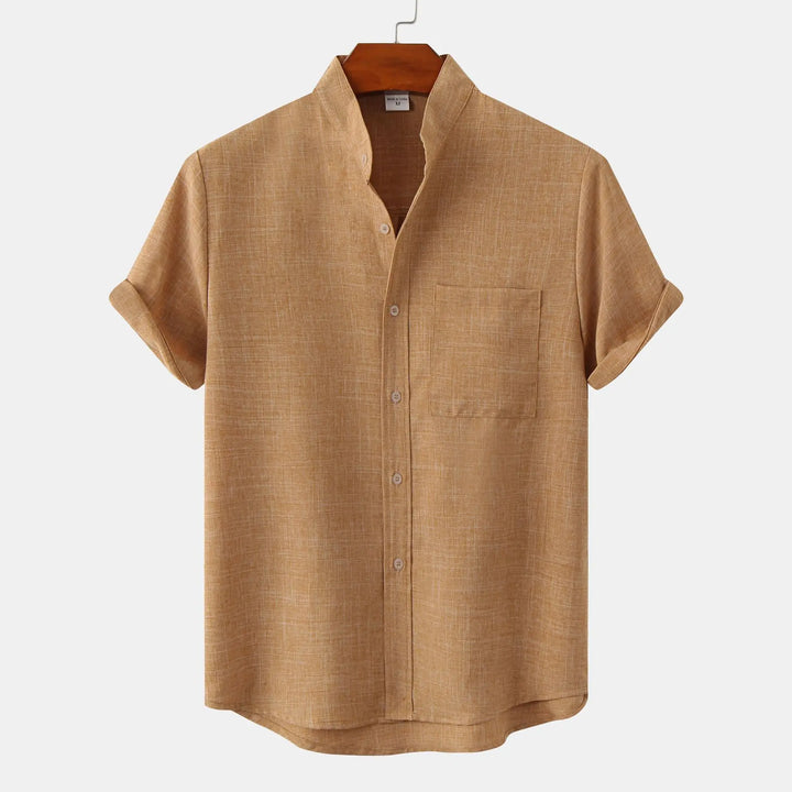 Stylish men's summer button-up shirt, lightweight, relaxed fit & comfortable for warm weather casual wear.