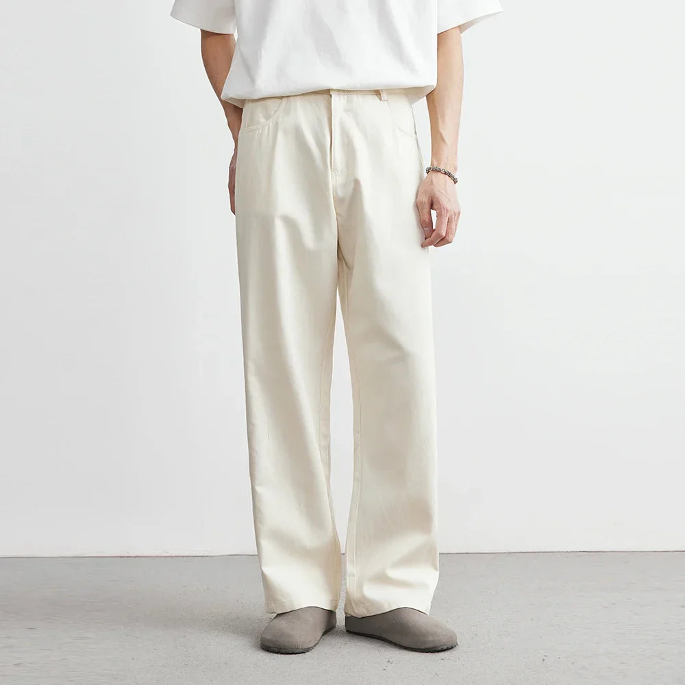 Apricot men's relaxed wide leg utility pants, ideal for everyday comfort and modern casual fashion.