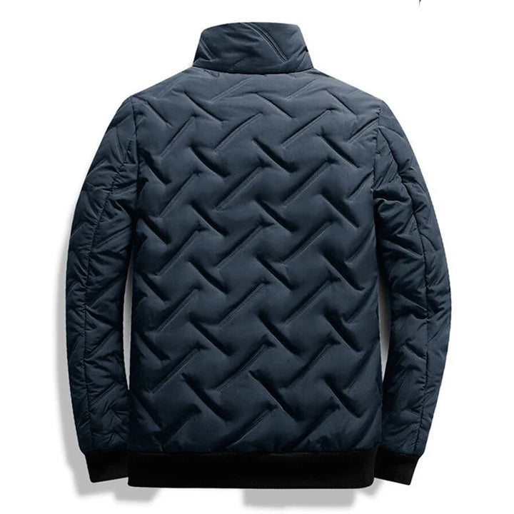 Soft, lightweight men's quilted jacket offering comfort and style, perfect spring/fall outerwear.