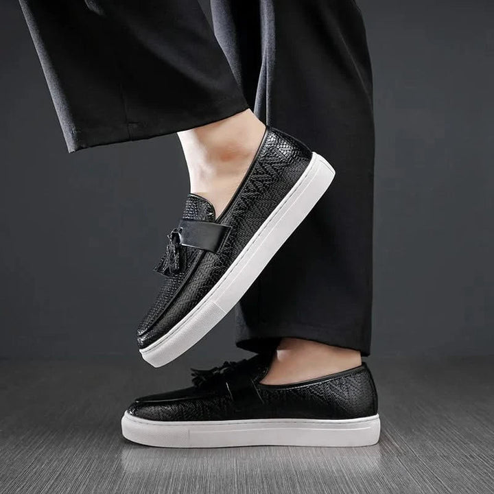 Man wearing Marcelli tassel loafers, enjoying slip-on comfort for a smart casual look. Everyday men's shoes.