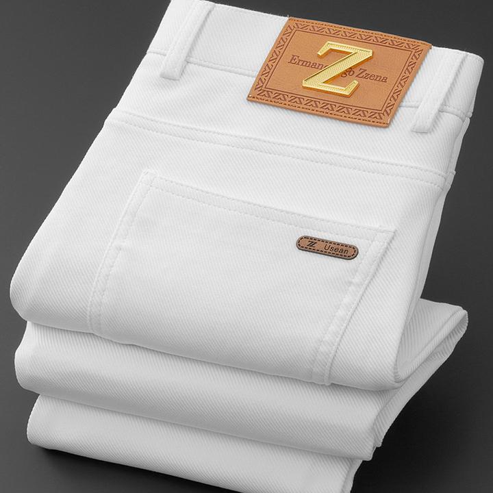 Green tailored vault jeans for men, offering a structured, smart casual denim alternative.