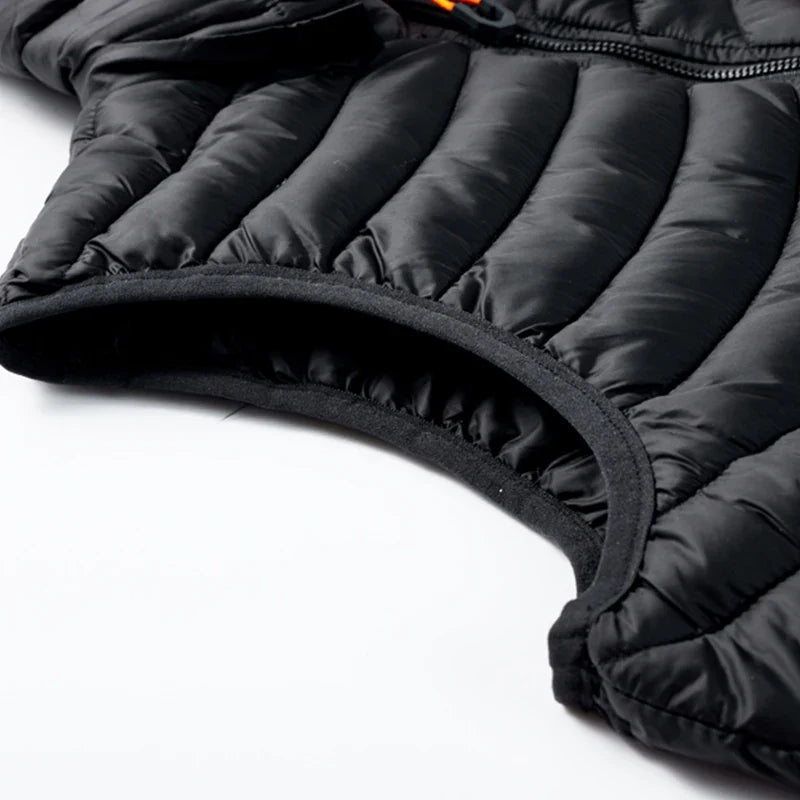 Modern men's fashion puffer vest for layering, insulated and equipped with a detachable hood. (Maroon)