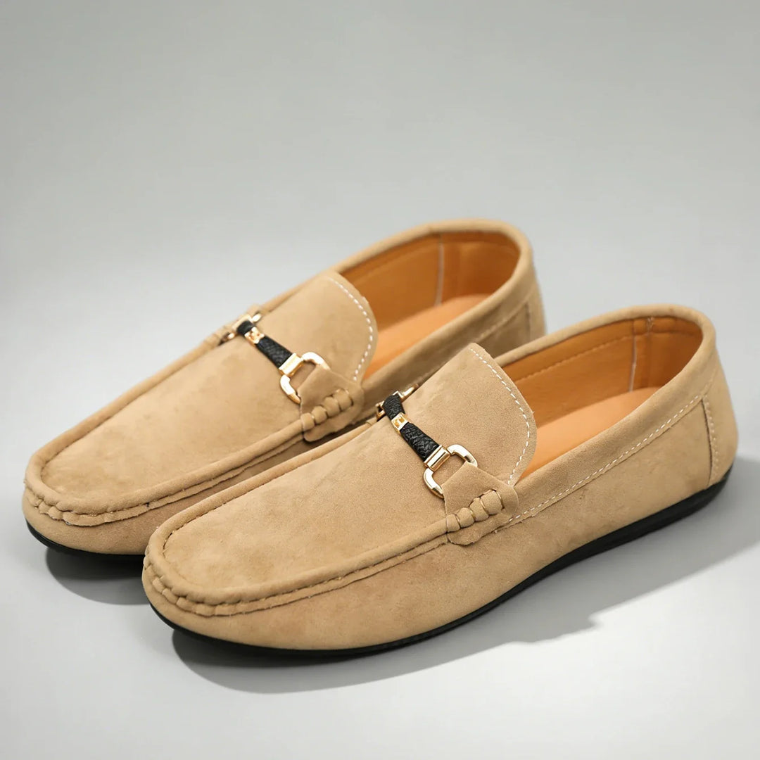 Men's classic slip-on loafers with polished metal buckle. Versatile & comfortable dress shoes for everyday.