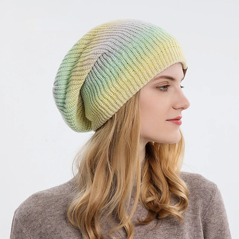 Colorful knit beanie, a comfortable unisex winter hat with a unique rainbow design.