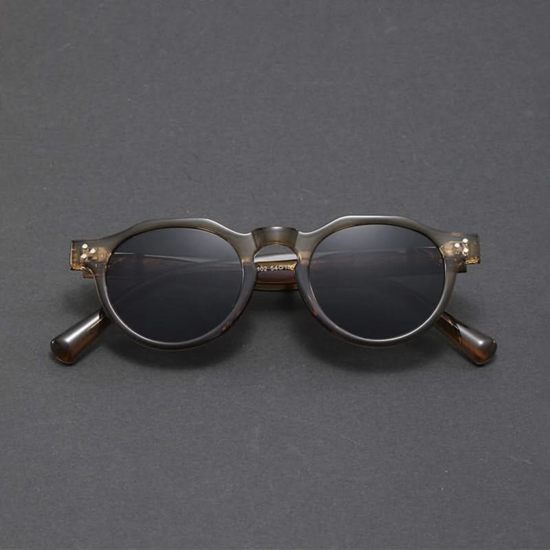 Vintage-inspired unisex polarized sunglasses. Features strong UV protection & a stylish retro design.